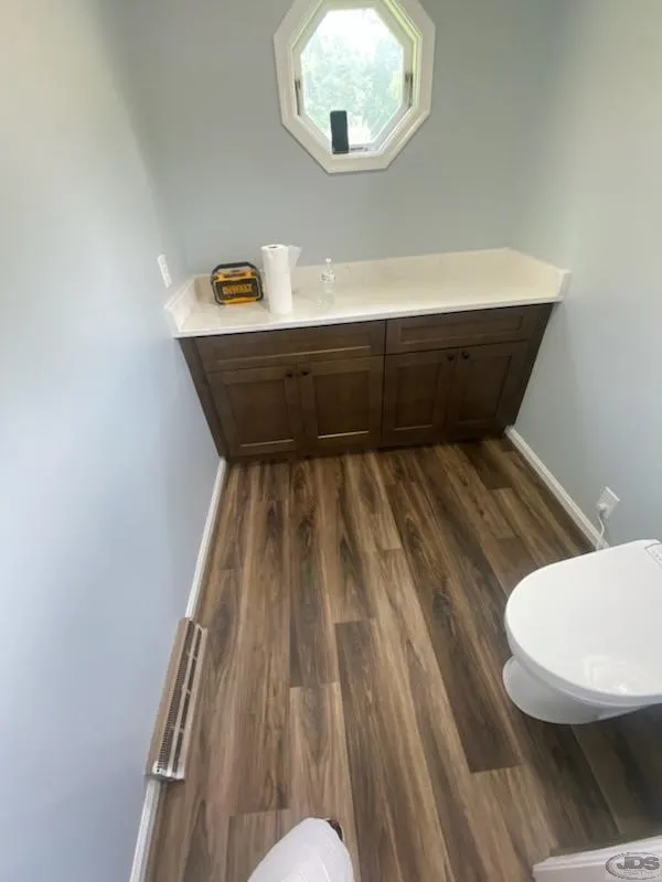 JDS Bath cabinet and counter top in toilet room disputanta va