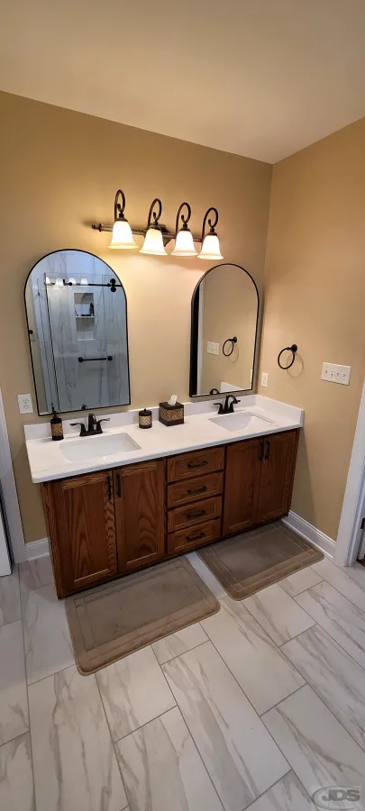 JDS Bath double vanity matching mirrors lighting large bathroom tile floor chester va