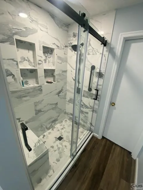 JDS Bath tile walk in shower glass semi frameless bypass doors tile bench hand held showerhead disputanta va