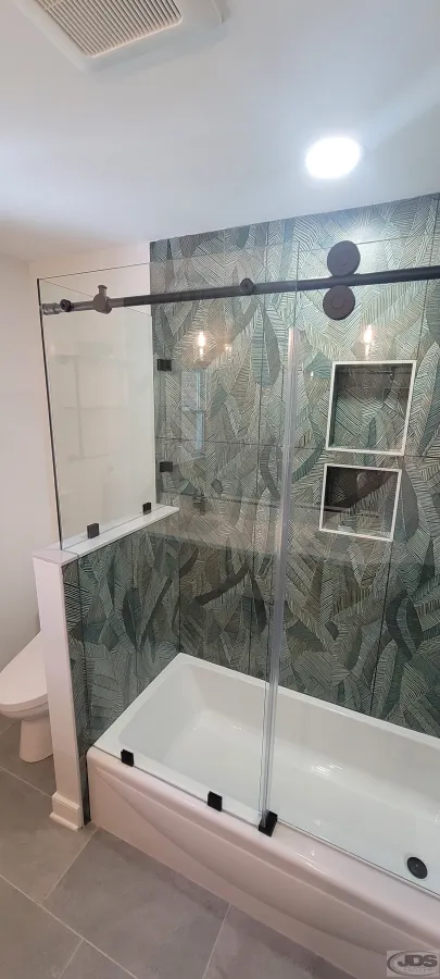 JDSBath acrylic bathtub tile wall surround barn door style glass door with glass panel knee wall richmond va