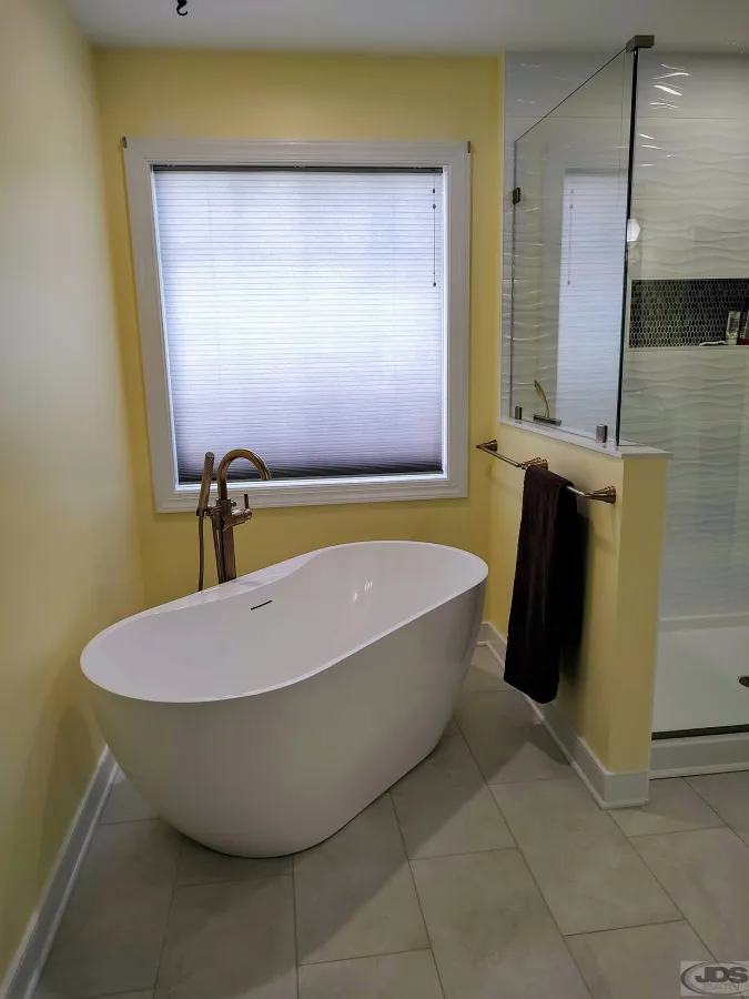 JDSBath soaking tub free standing telephone showerhead knee wall with frameless glass panel centeral va