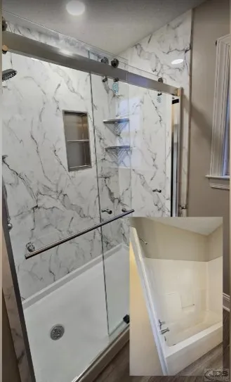 JDSBath tub to shower conversion full wall acrylic marble color niche shelves barn door style semi frameless bypass glass door matching hardware centeral va
