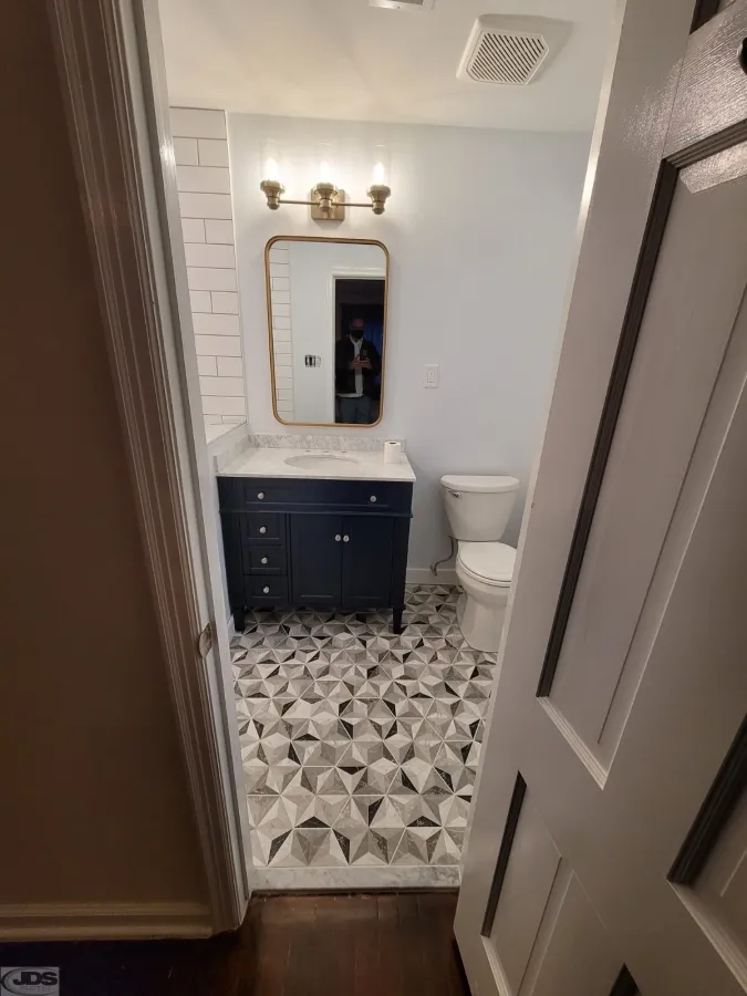 JDS Bath after image of backsplash and lighting in Richmond