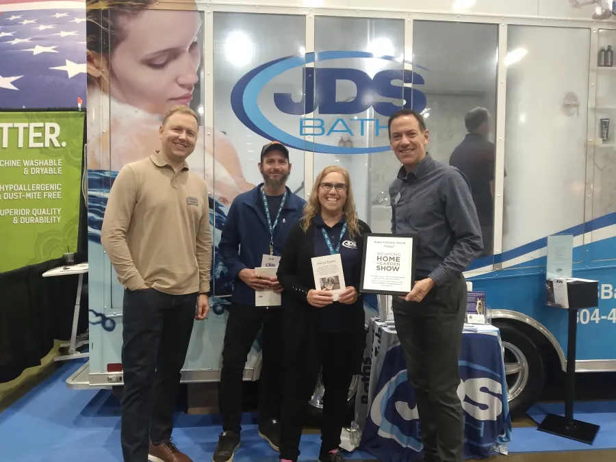 JDSBath crew receiving richmond home + garden show 2024 happy exhibitor award friday richmond va