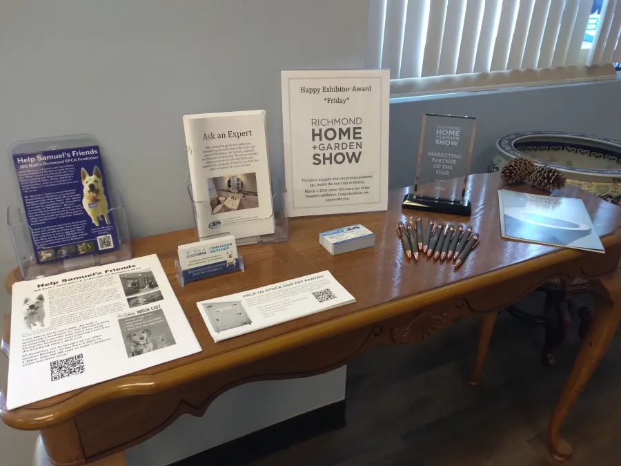 JDSBath office information table richmond home + garden show happy exhibitor award friday 2024 and marketing partner of the year 2025 richmond spca