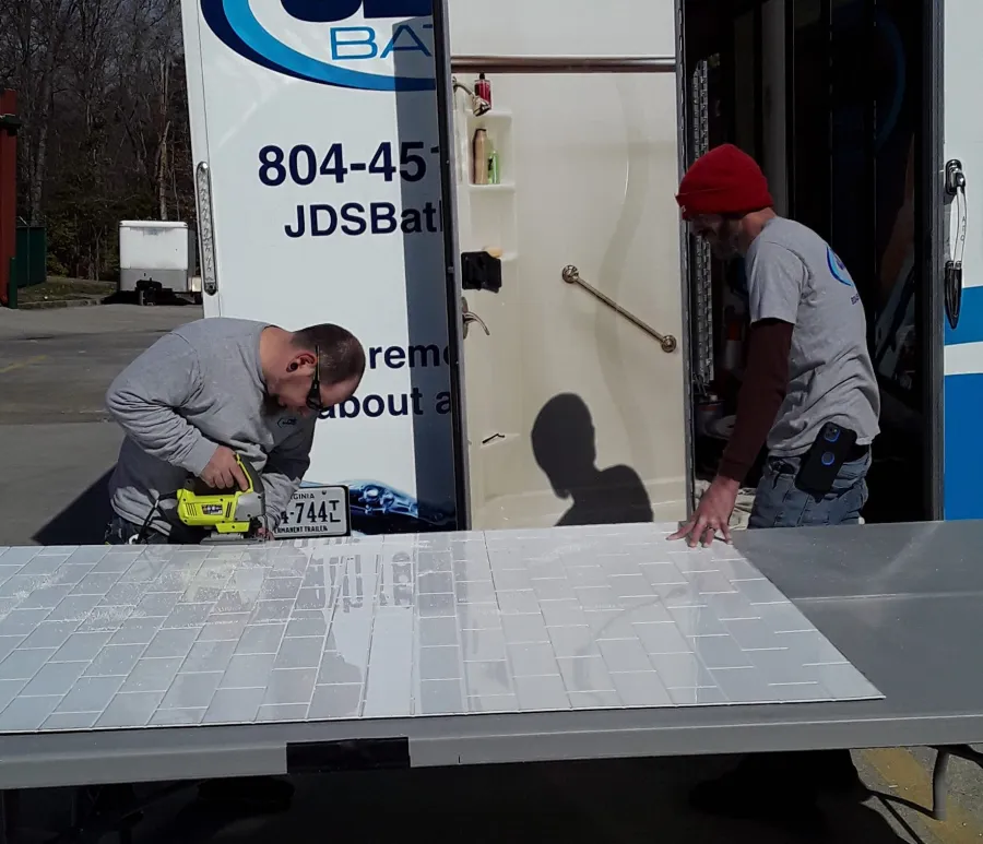 JDSBath replacing acrylic bathtub wall surround in mobile showroom richmond home + garden show 2022