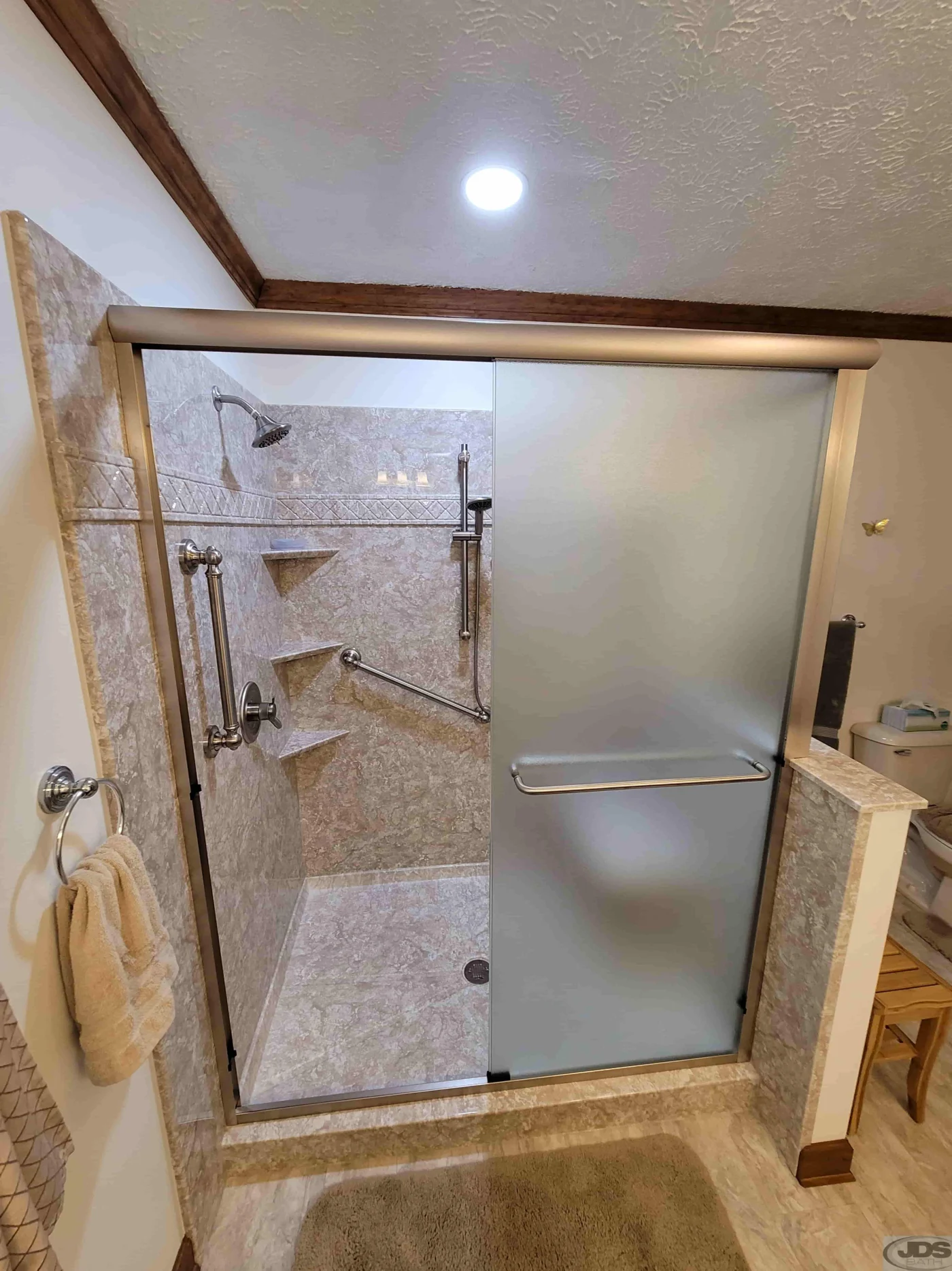 A picture of bypass shower doors installed by JDS Bath