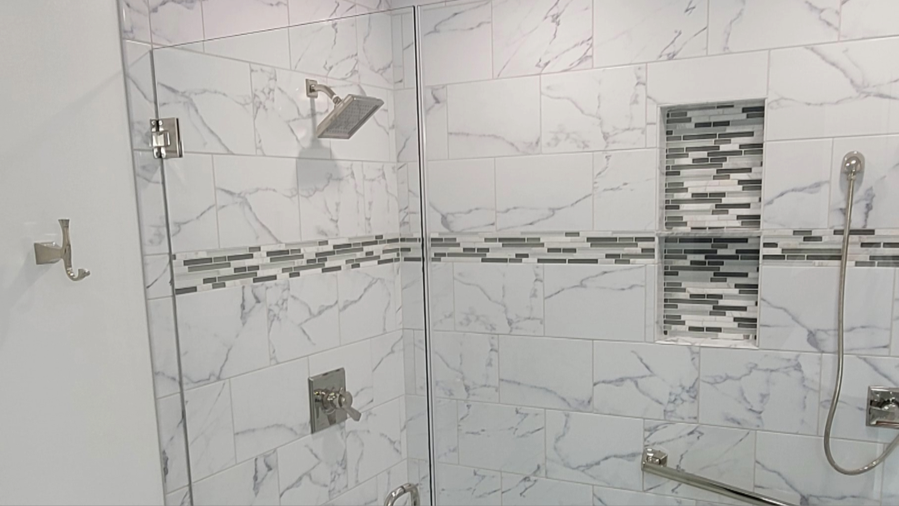 A shower replacement with glass enclosed do