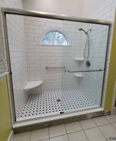 A fresh walk-in shower conversion that feels open and modern.