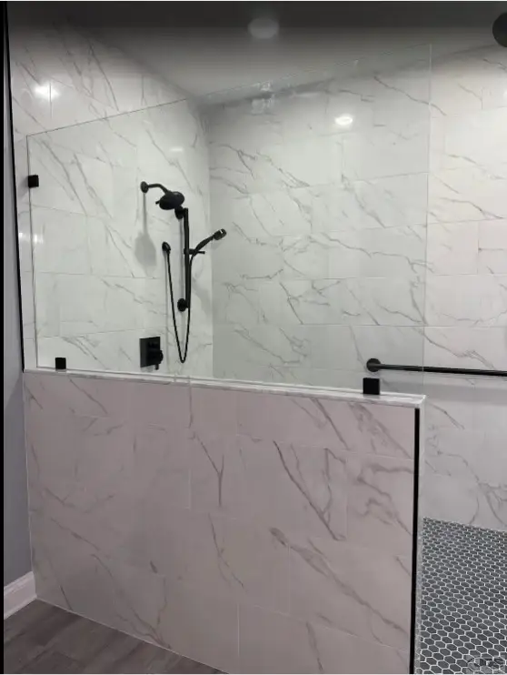A walk-in shower with no threshold built around mobility issues.
